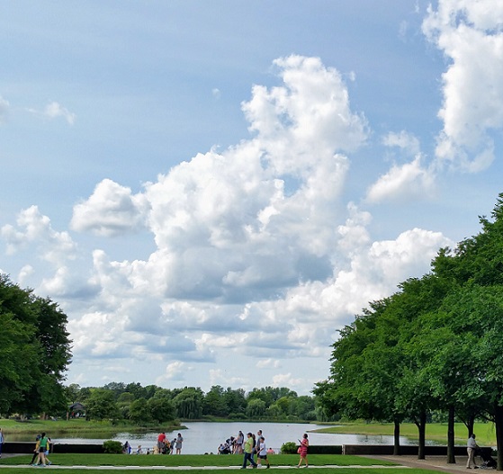 Blue Sky With People Wearing Shoes