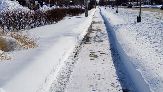 Sidewalk and Freshly Plowed Snow