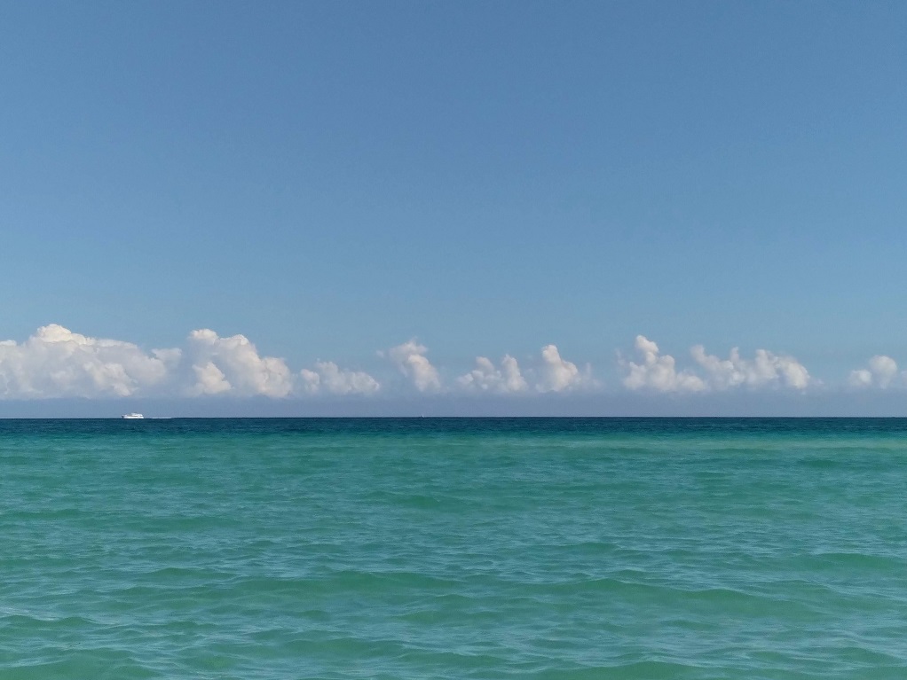 Atlantic Ocean, Clouds and Boat